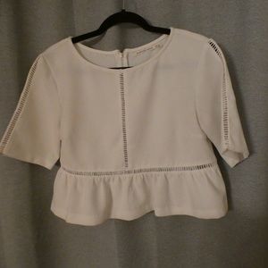 Cropped white peplum top! Detailed sleeve and mid